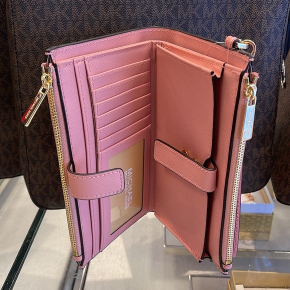 MICHAEL KORS
Jet Set Large Leather Smartphone Wristlet Wallet
Primrose 
NWT - Picture 7 of 16